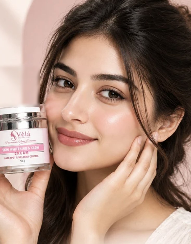 Model holding Vèla Skin Whitening & Glow Cream